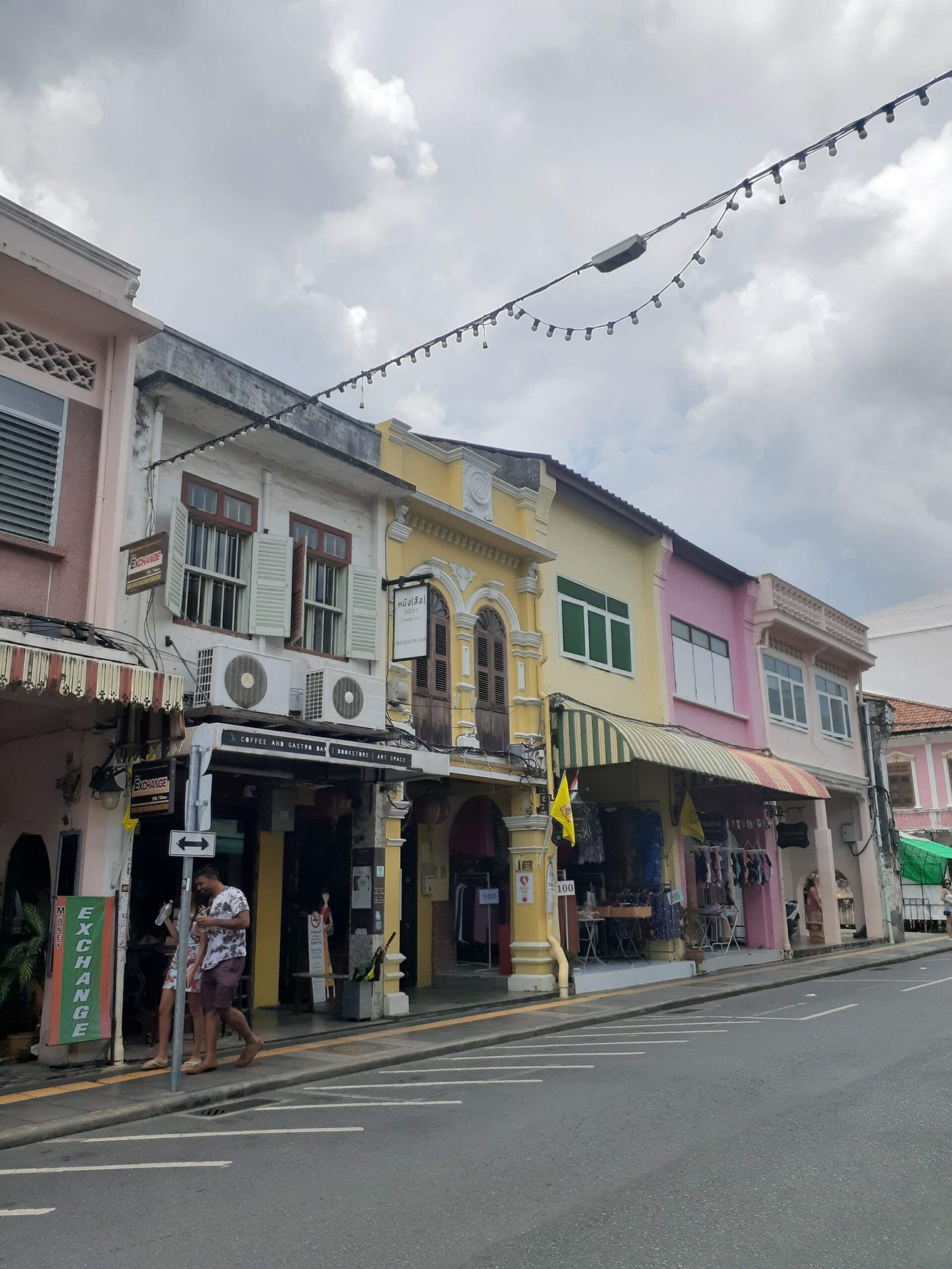 Colorful shophouses along a street in Thailand