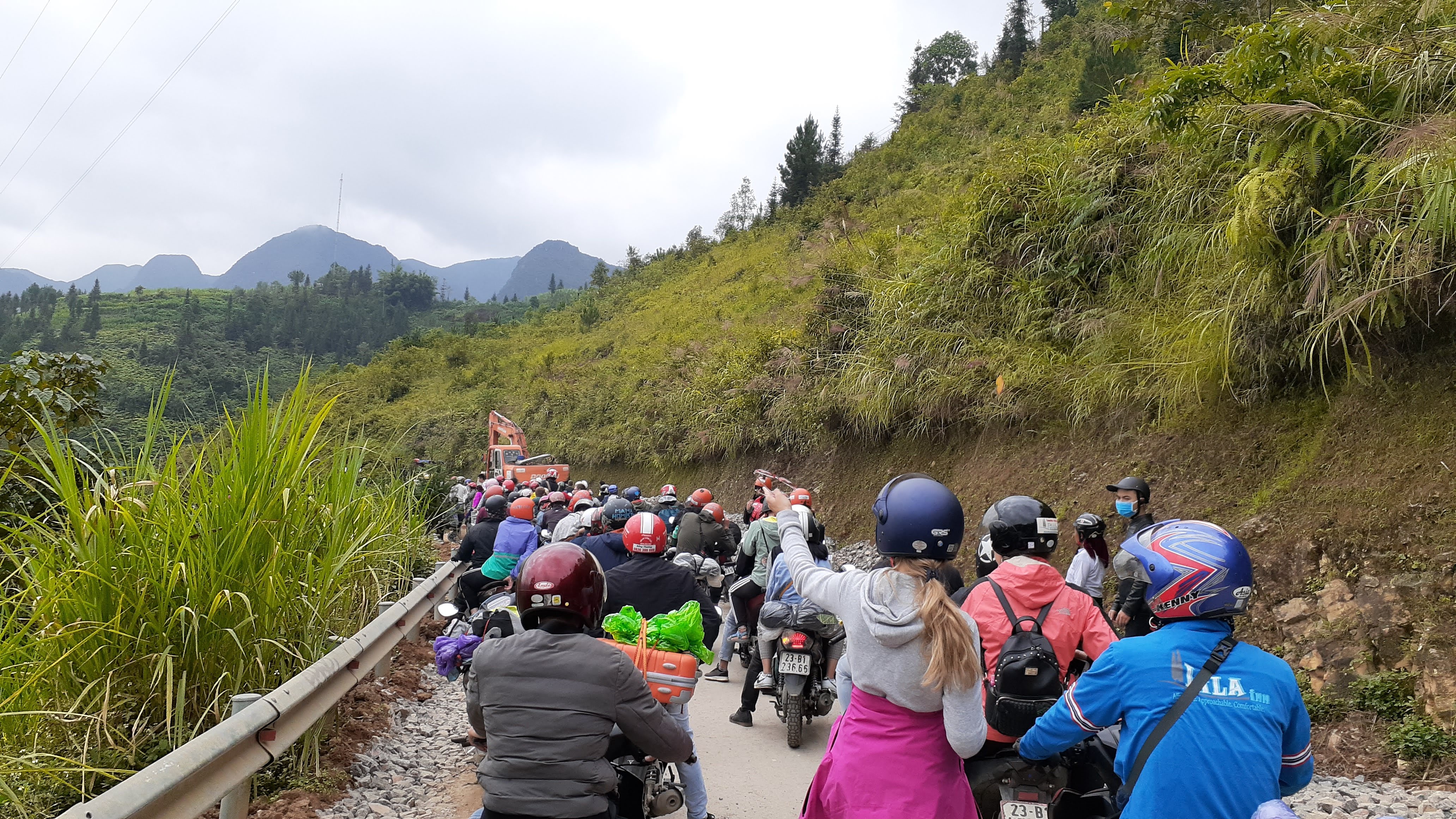 Motorbike traffic on a mountain road in Southeast Asia