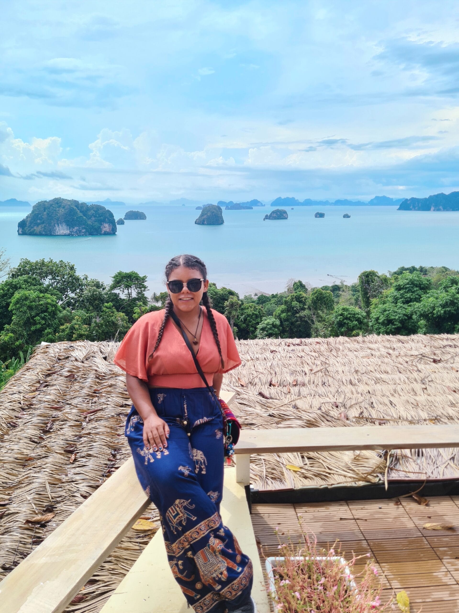 Nana at a viewpoint in Ao Luek with islands and water behind her