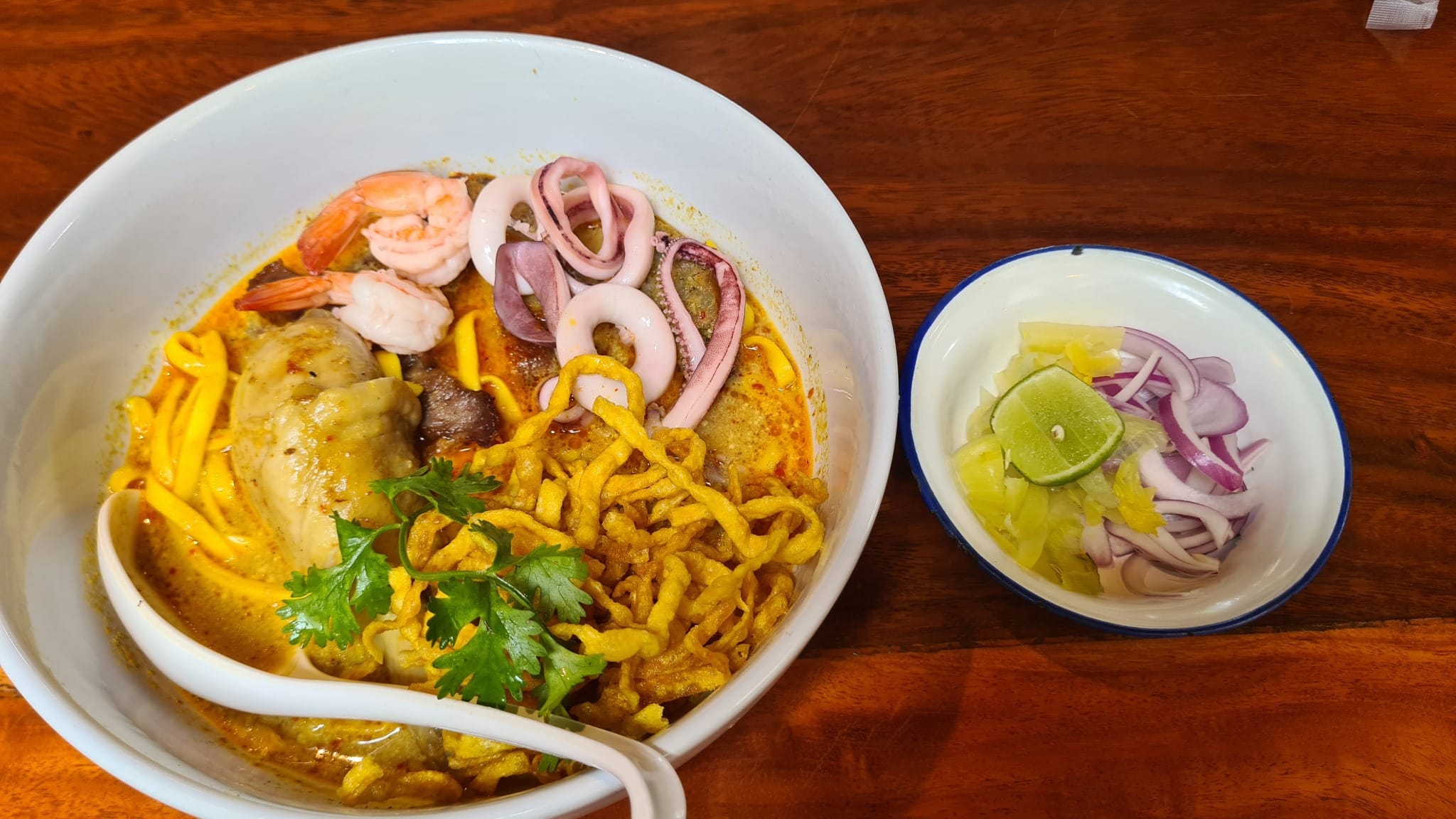 Bowl of khao soi noodle curry in Chiang Mai