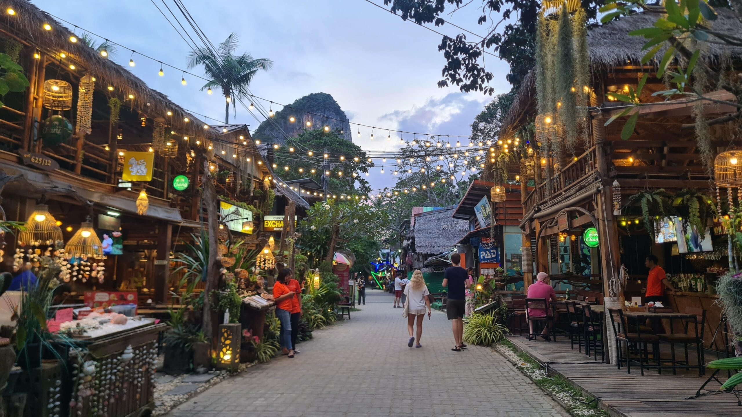 Railay walking street with restaurants and limestone cliffs