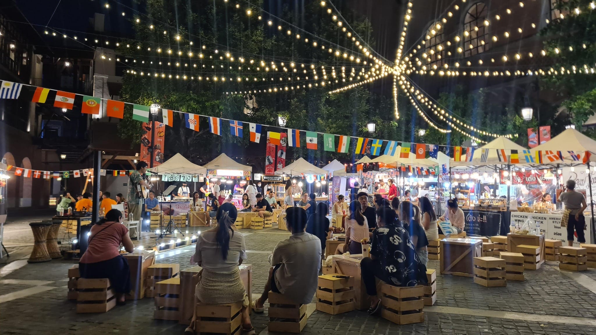 Chiang Mai night market with food stalls and string lights