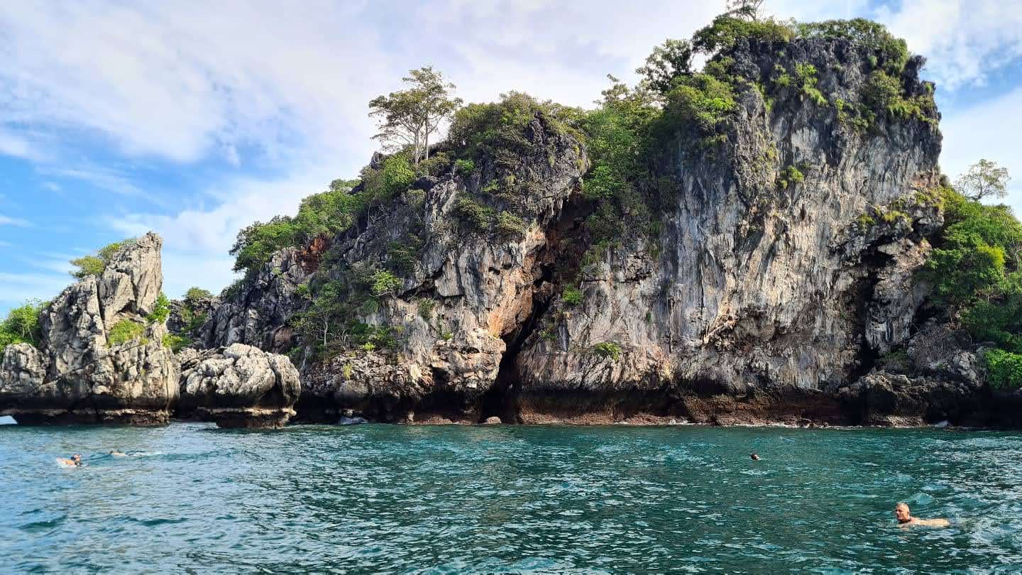 Quiet beach and turquoise water in Southern Thailand on December 25