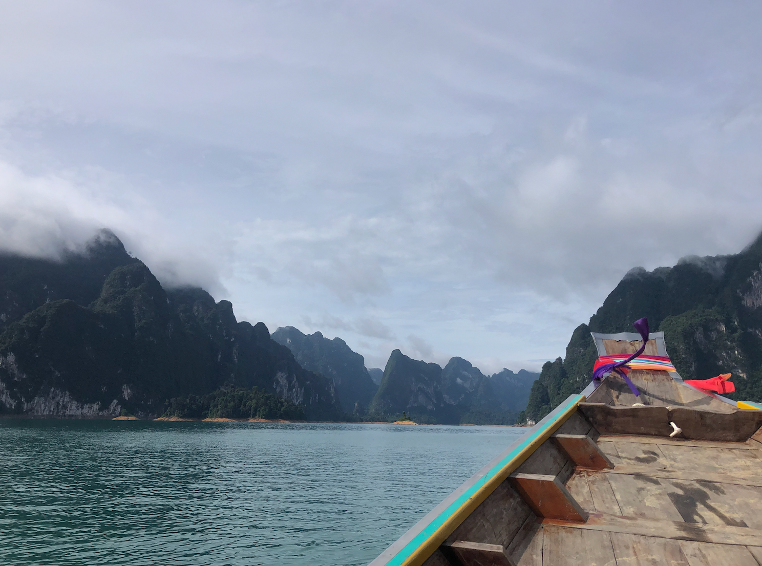 Longtail boat moored on Cheow Lan Lake in Khao Sok National Park