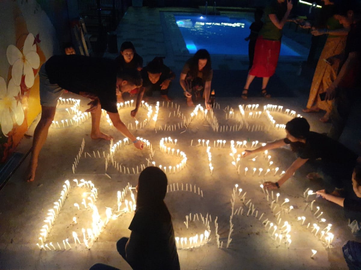 Thadingyut candles glowing at a hostel in Myanmar in 2019