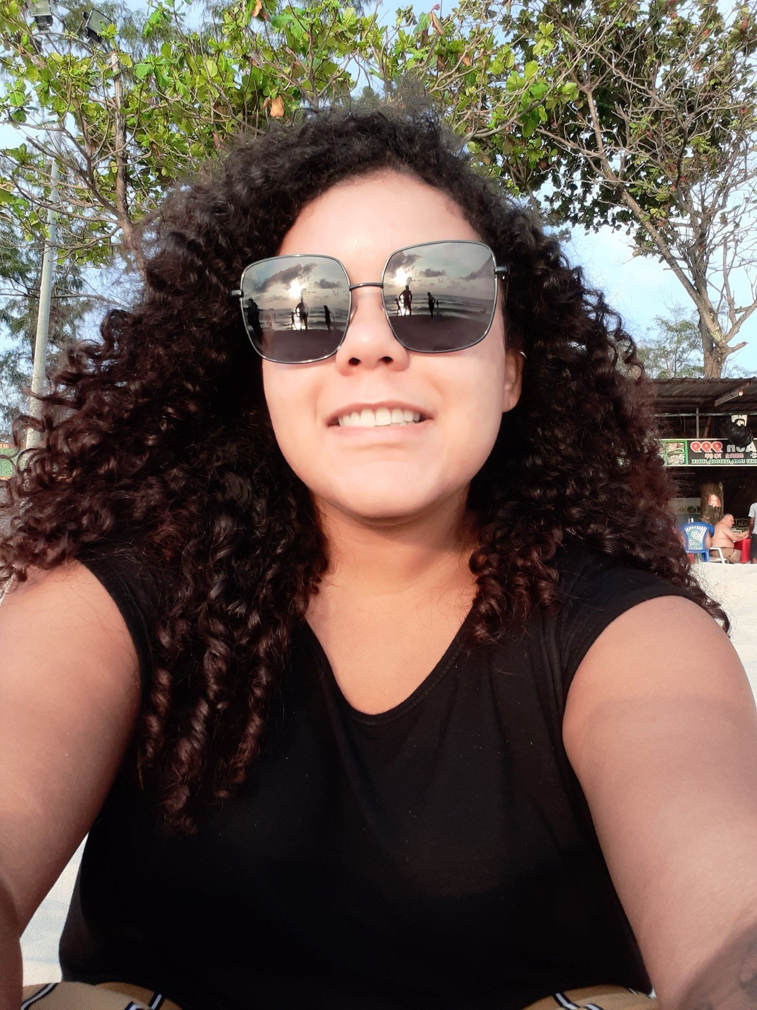 Nana taking a selfie near Patong Beach in Phuket in 2019