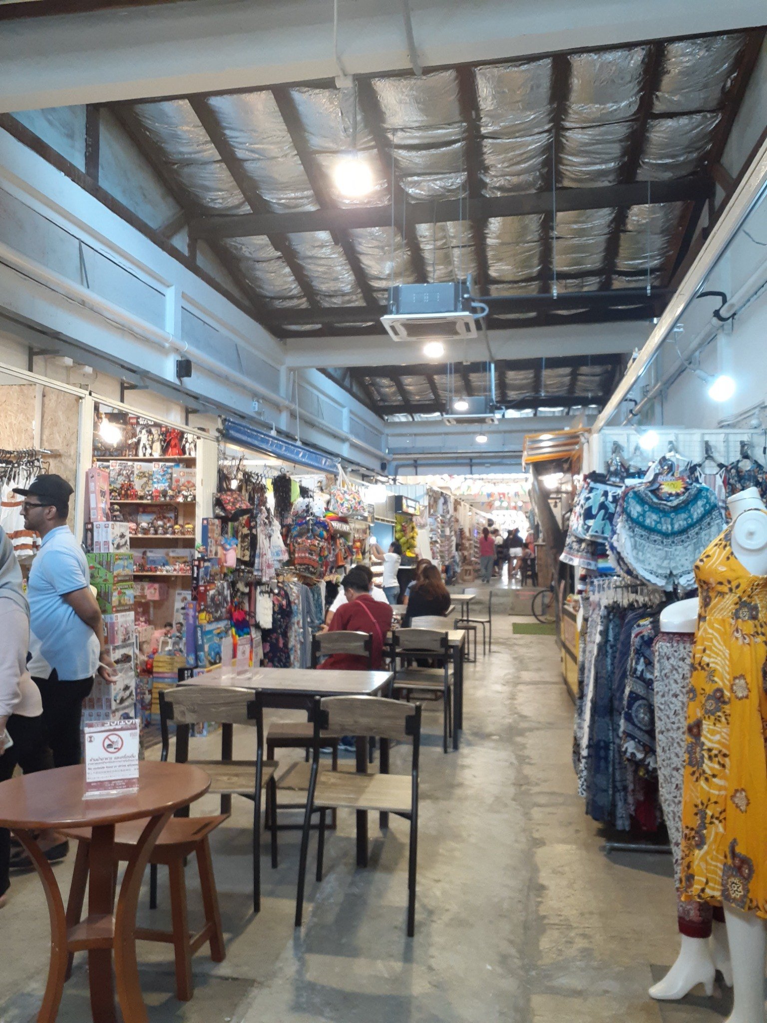 Indoor market stalls and tables in Phuket Town in 2019