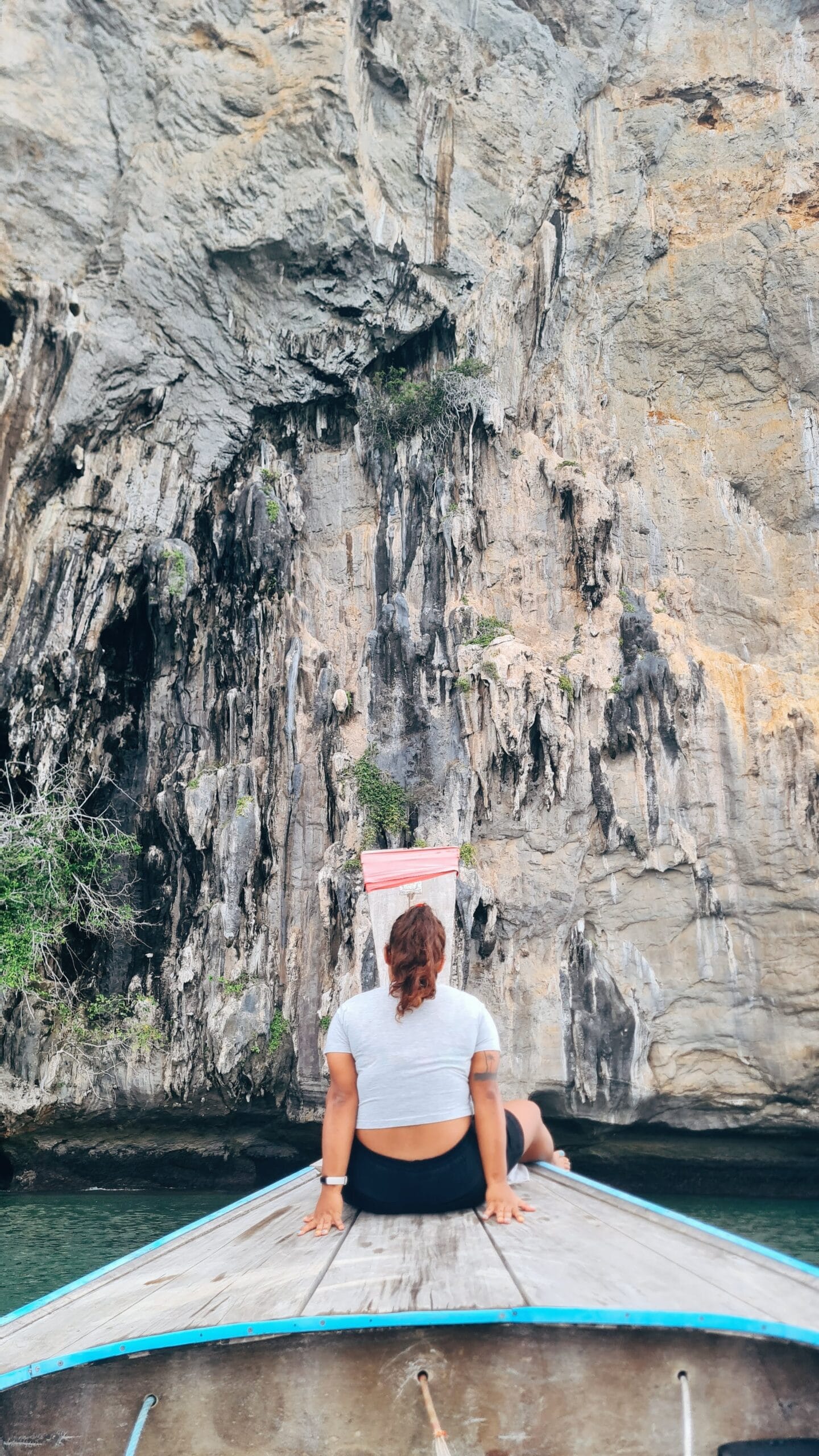 Nana traveling alone by boat in Thailand