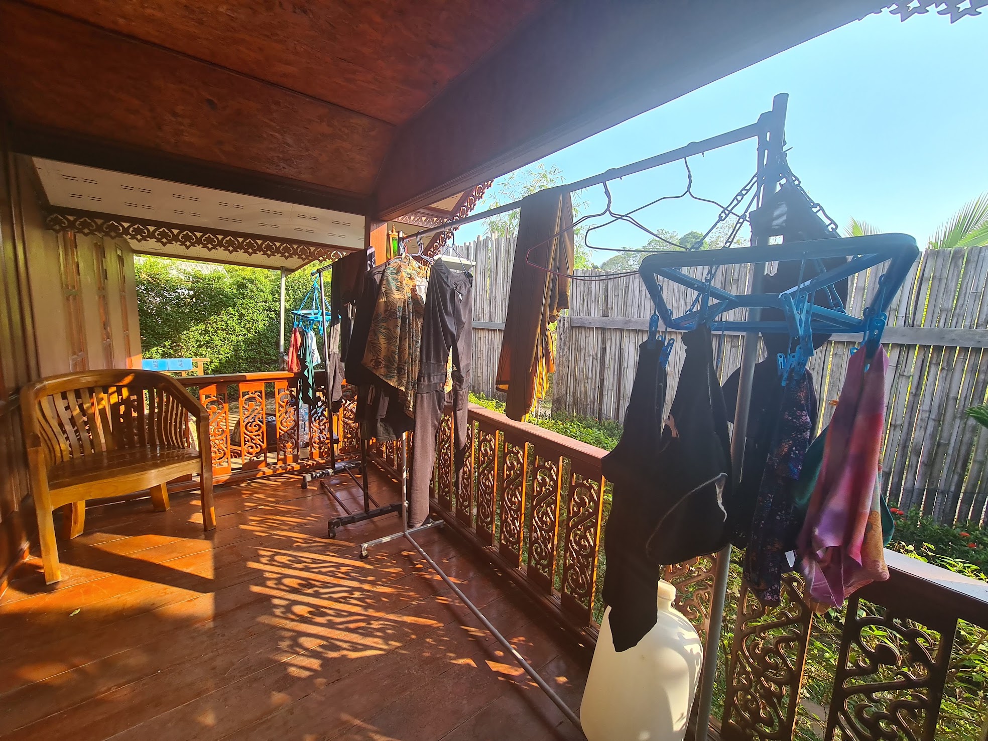 Laundry drying on the porch of my home in Thailand